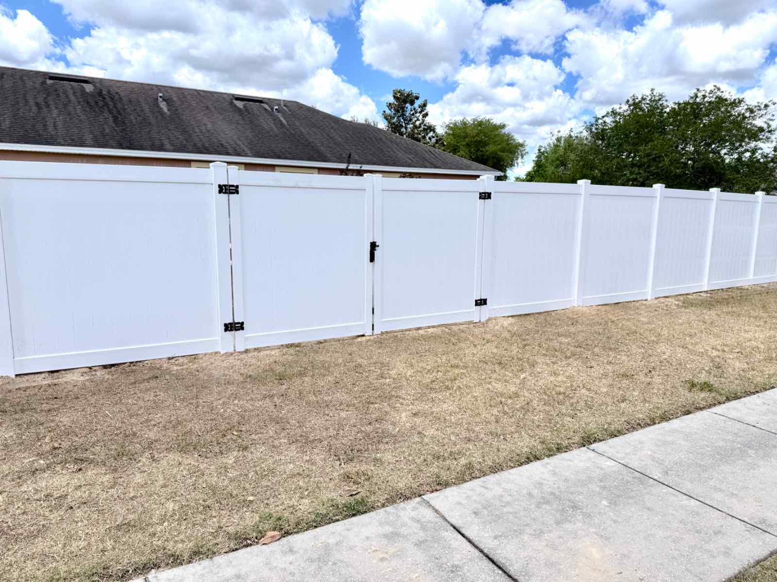 white Vinyl Privacy installed in Spring Hill, Florida by Florida Friendly Fencing.