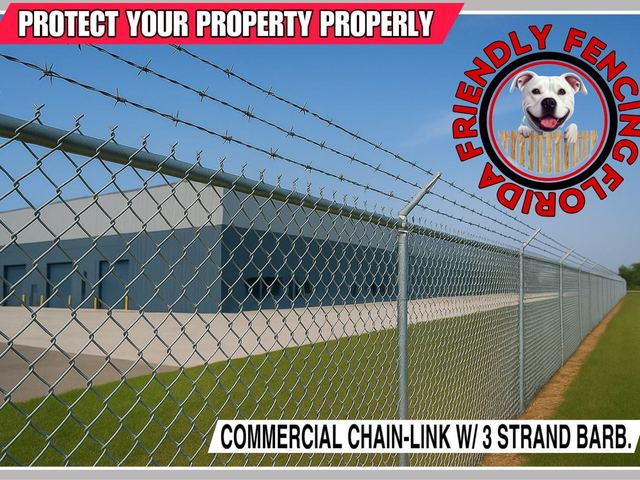 Commercial chain link security fence with 3-strand barbed wire